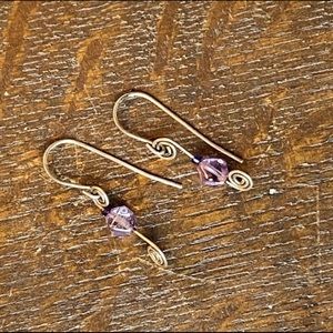 2/$20 silver spiral wire with purple crystals earrings